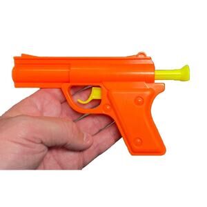 VTG Ja Ru Dart Toy Pistol Blaster Gun Rubber Plastic Orange Spring Pull Back